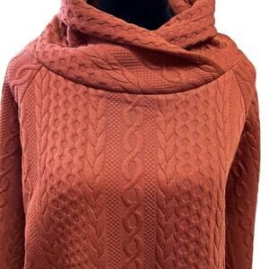 Staccato M women’s long sleeve top, rusty paprika color.